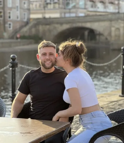 James and Kush sitting by the river